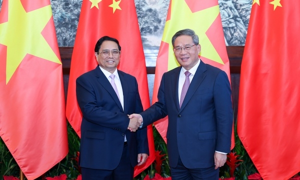 李强会见越南总理范明政